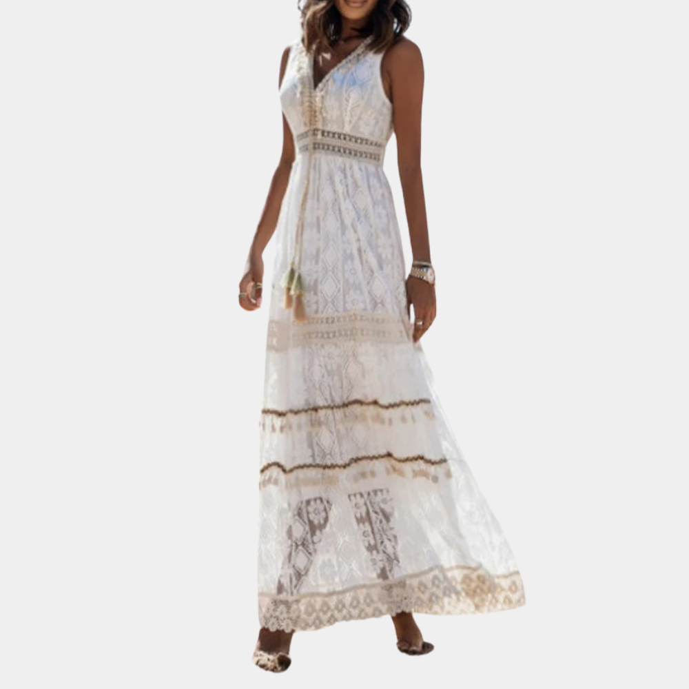 Elegancka damska sukienka maxi boho, lekka kreacja na lato i wiosnę. Stylowa na plażę lub casualowe dni.