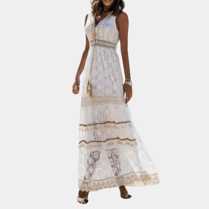 Elegancka damska sukienka maxi boho, lekka kreacja na lato i wiosnę. Stylowa na plażę lub casualowe dni.
