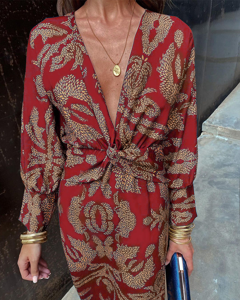 Damska sukienka maxi boho z dekoltem V, letni nadruk. Idealna do casualowych i eleganckich stylizacji na lato.