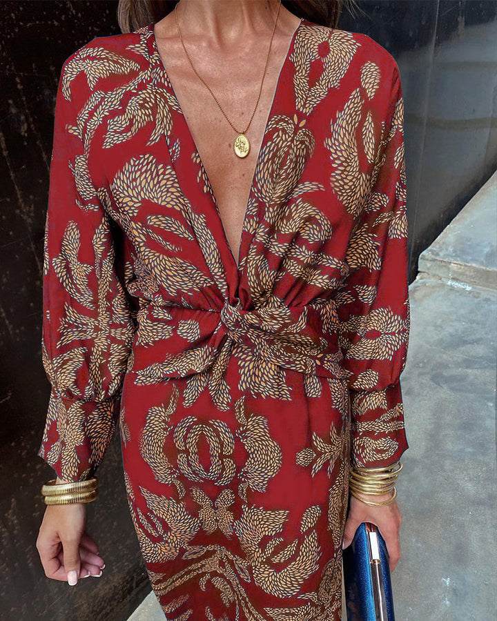 Damska sukienka maxi boho z dekoltem V, letni nadruk. Idealna do casualowych i eleganckich stylizacji na lato.