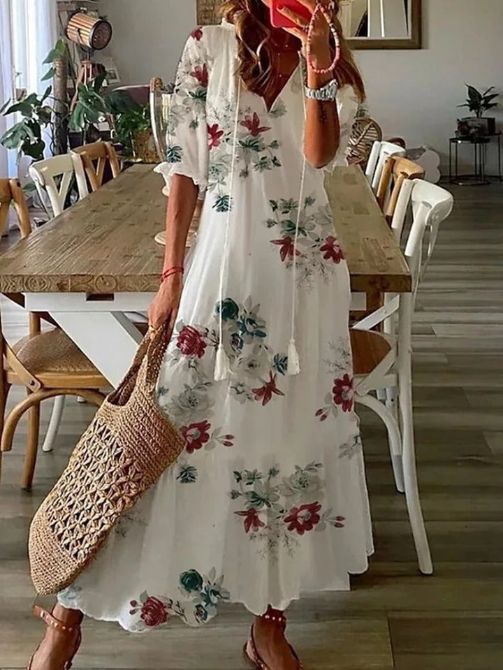 Wzorzysta damska sukienka maxi letnia boho z dekoltem V. Zwiewna, plażowa, idealna na lato i wakacje.