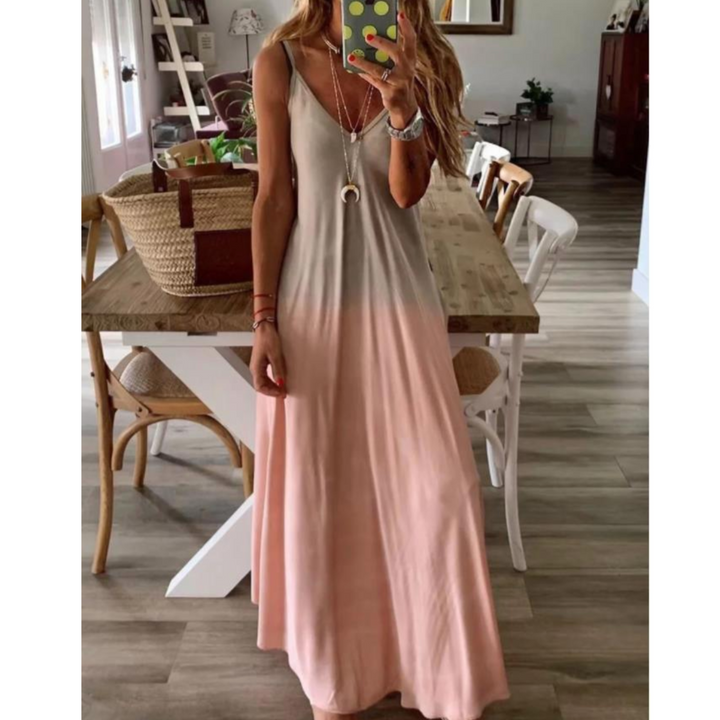 Stylowa damska sukienka maxi ombre, dekolt V, rozkloszowany dół, idealna na upalne dni i wyjścia.