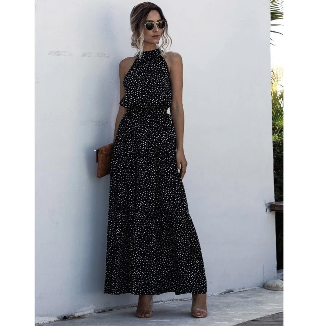 Modna sukienka damska maxi w kropki, z eleganckim wiązaniem w pasie, komfortowa i stylowa.