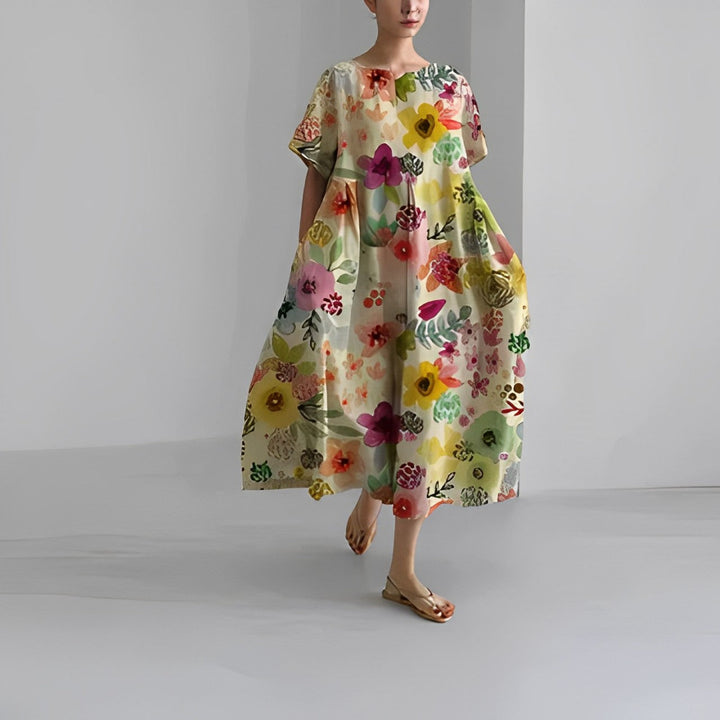 Elegancka sukienka midi Inez z luźnym krojem i modnym nadrukiem, uniwersalna damska odzież.