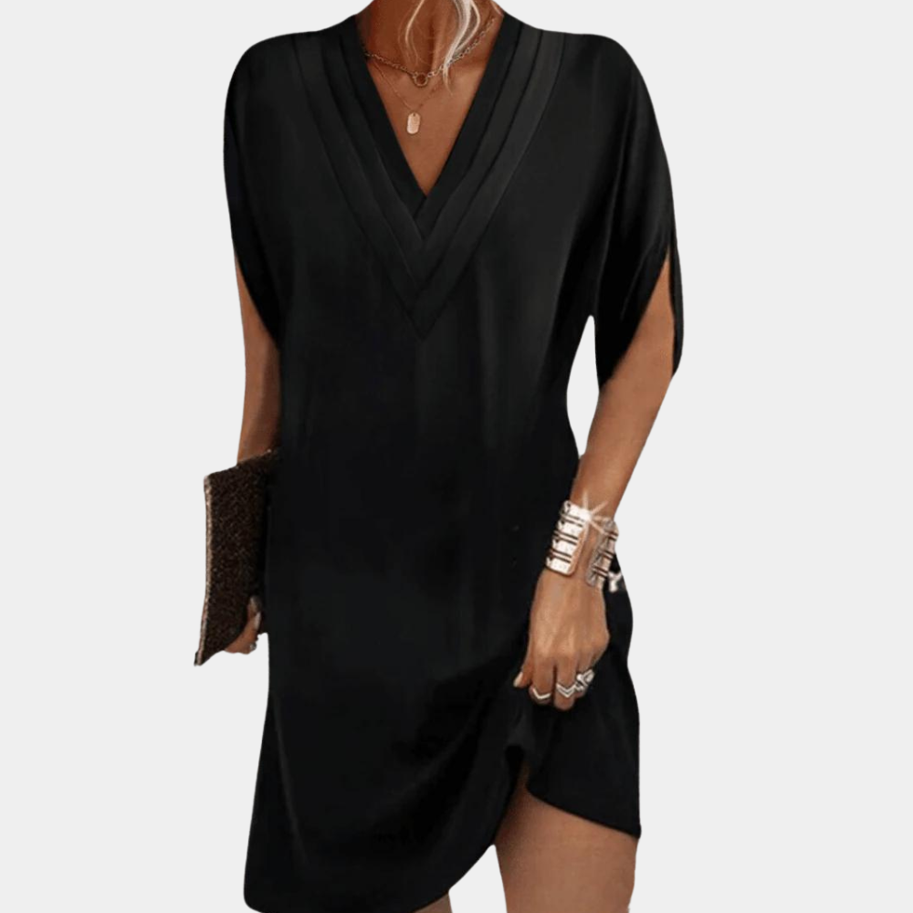 Luźna sukienka midi V-neck dla kobiet, elegancki casual look na wiosenne i letnie dni.
