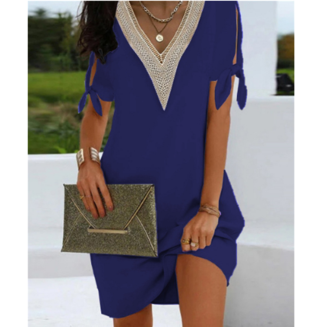 Elegancka sukienka shift mini damska, z dekoltem V. Idealna do letnich i wieczorowych stylizacji, modna i wygodna.