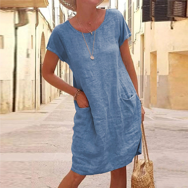 Wygodna damska sukienka shift mini casual z okrągłym dekoltem i kieszeniami. Stylowa letnia moda.