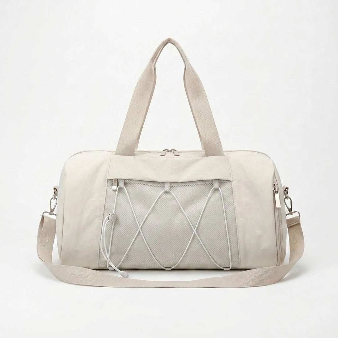 Elegancka damska torba duffel na siłownię. Idealna torba sportowa do podróży i codziennego fitnessu.