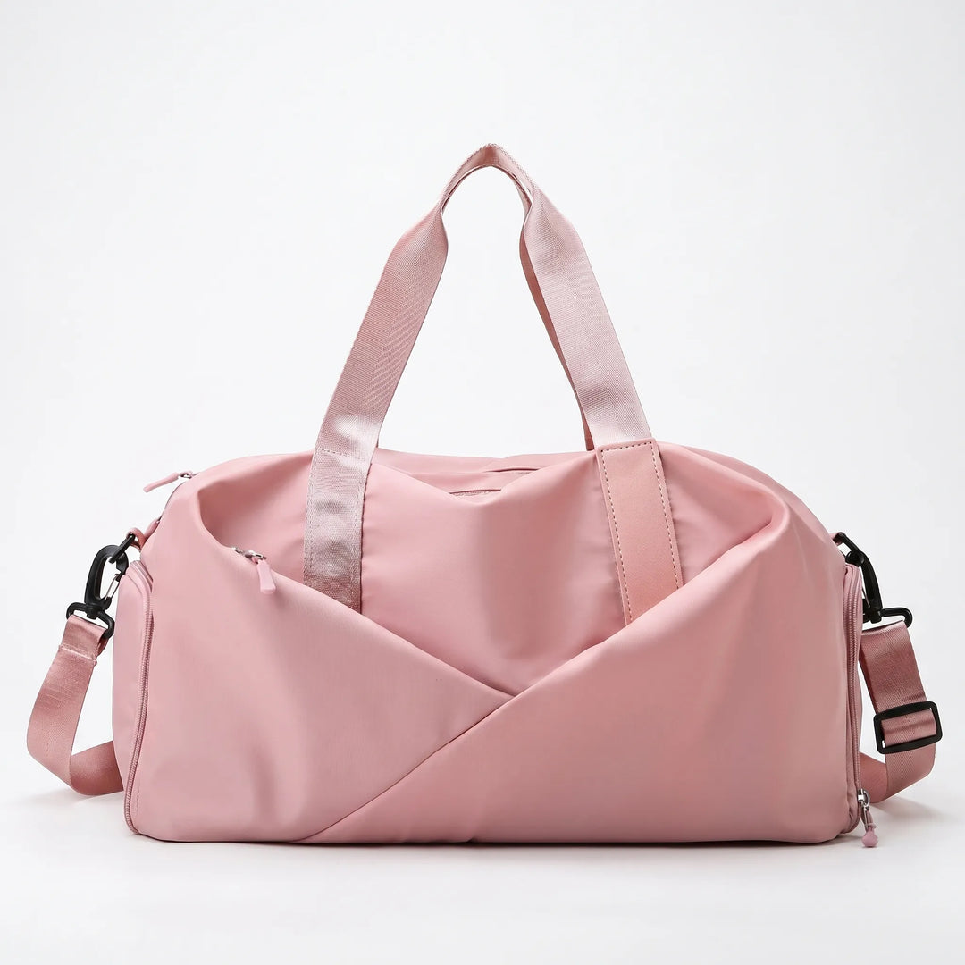 Elegancka czarna torba sportowa damska, idealna na siłownię i krótkie wyjazdy. Posiada komorę na buty.