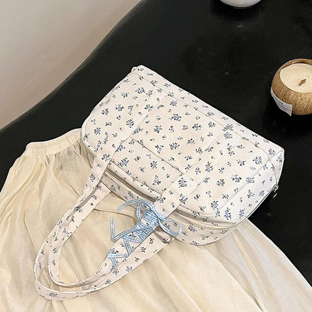 Torba Duffle Floria – damska, płócienna, elegancka, z kokardą, idealna na weekend.
