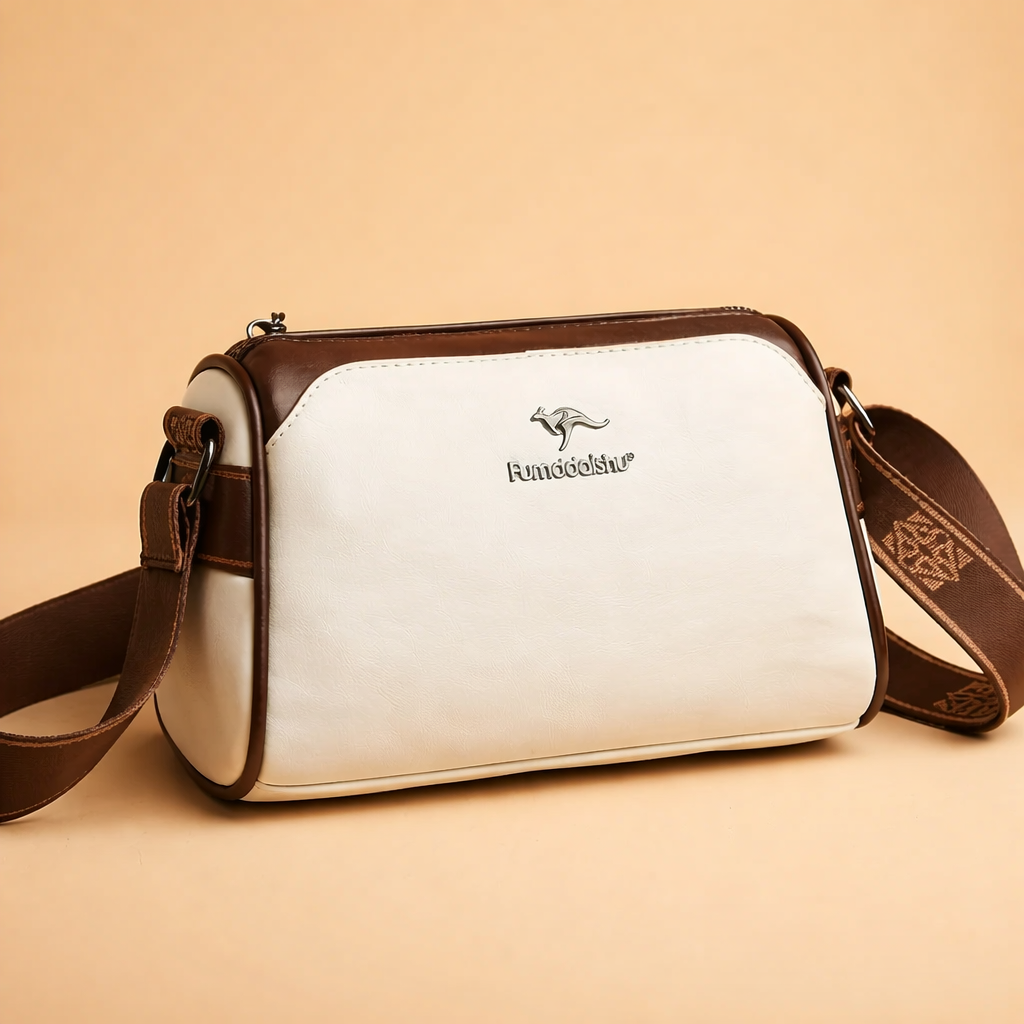 Czarna torebka crossbody z ekoskóry, funkcjonalna, z regulowanym paskiem. Stylowa i miejska.