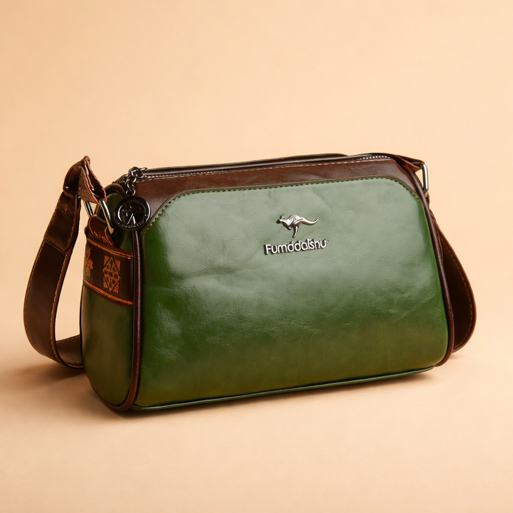 Elegancka brązowa torebka crossbody z wysokiej jakości skóry wegańskiej, z paskiem na ramię.
