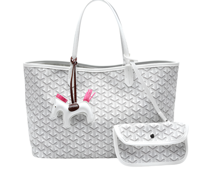 Pojemna torebka damska shopper bag na ramię z modnym, drukowanym wzorem. Praktyczne akcesorium na zakupy.