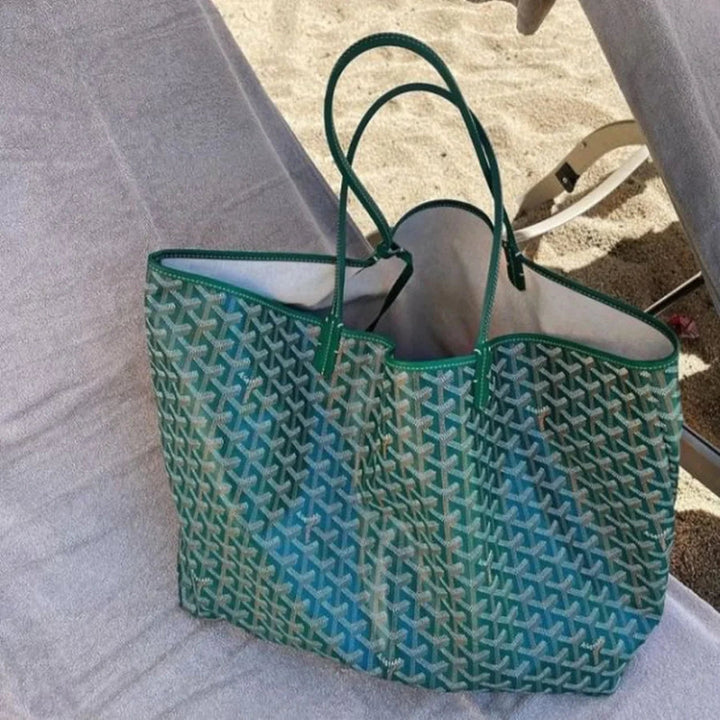 Torebka damska z artystycznym, drukowanym wzorem na ramię. Elegancki i funkcjonalny dodatek do stylizacji.