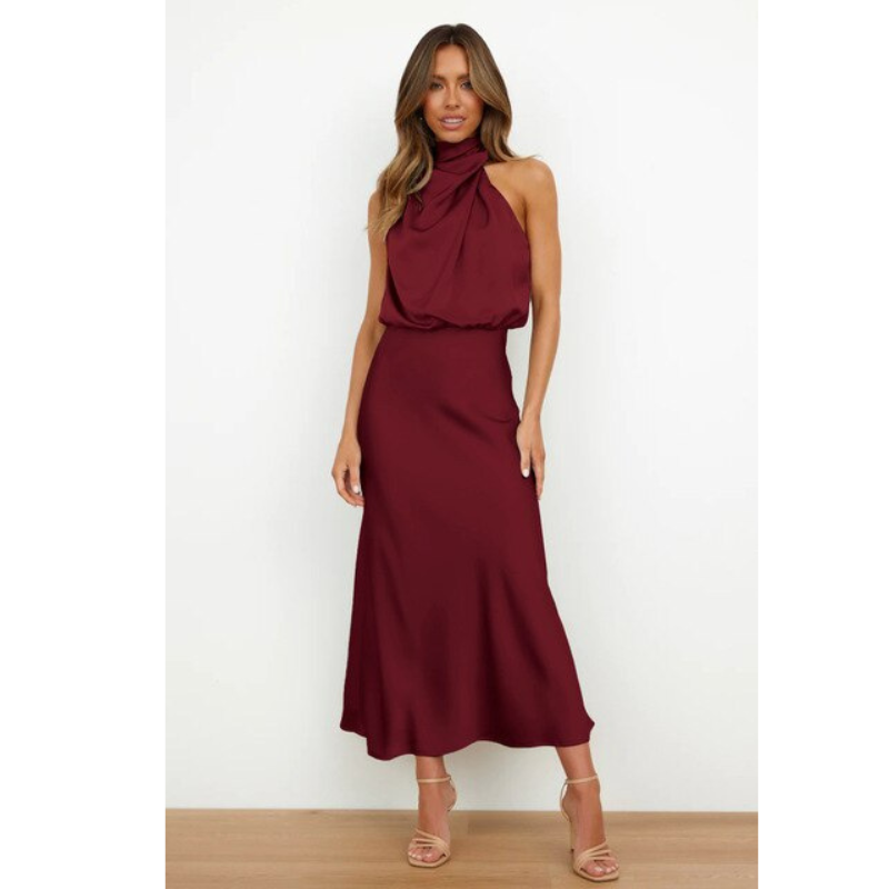 Długa sukienka wieczorowa maxi z modnym dekoltem halter. Elegancka i wygodna sukienka damska na przyjęcia i bankiety.