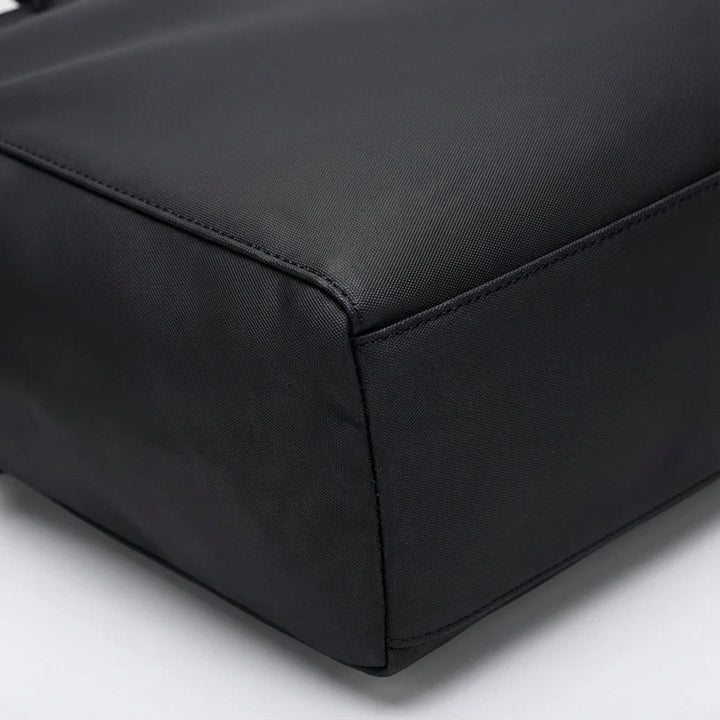 Elegancka torba biznesowa DryCarrier, wodoodporna i praktyczna na laptopa. Idealna do biura i podróży.