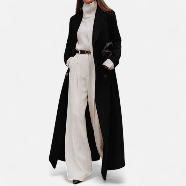 Czarny długi płaszcz damski zimowy. Stylowy maxi płaszcz z guzikami, idealny do eleganckich stylizacji.
