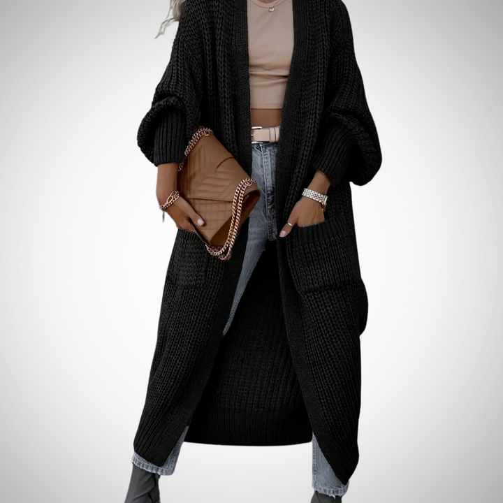Damski długi kardigan z dzianiny, elegancki sweter oversize w kolorze czarnym, idealny na chłodne dni.