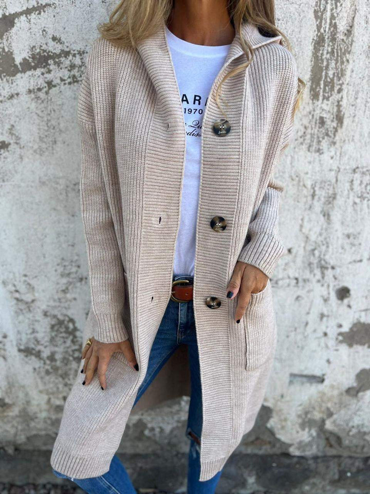 Modny damski sweter o luźnym kroju, długi kardigan z kapturem, doskonały do casualowych stylizacji.