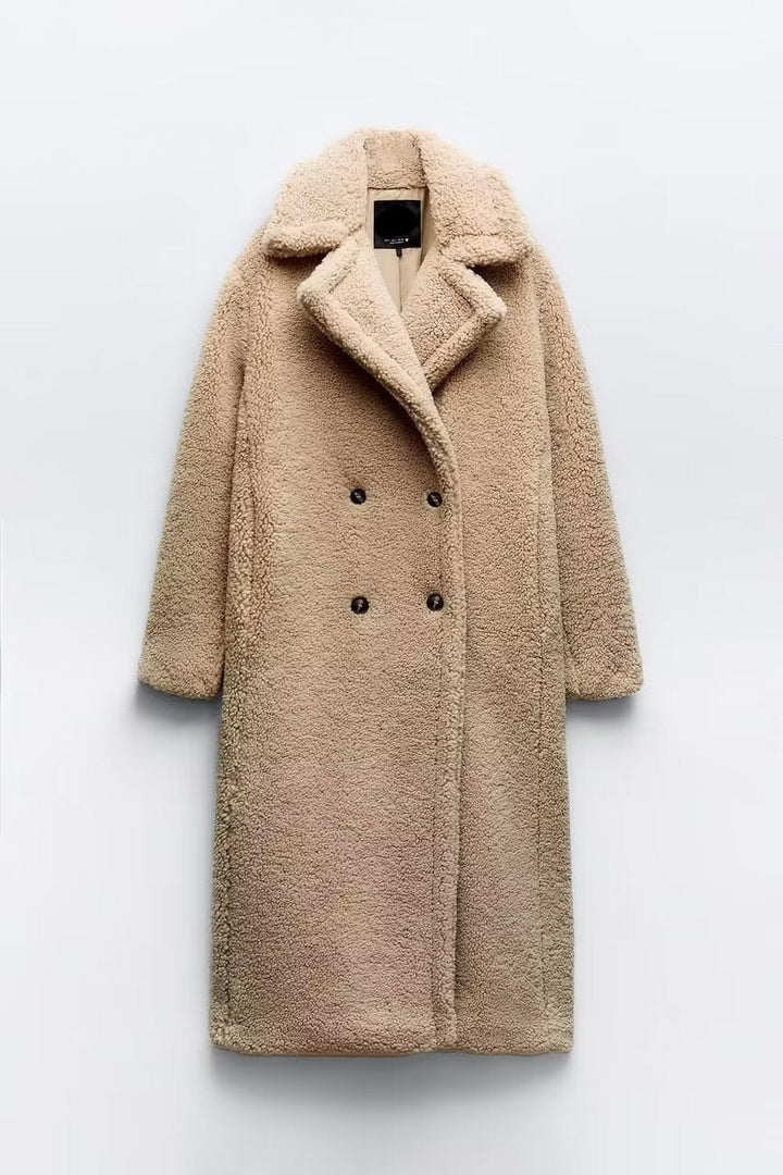 Damski płaszcz z luźnym krojem, dwurzędowy. Modny płaszcz przejściowy, elegancki dodatek do jesiennych outfitów.