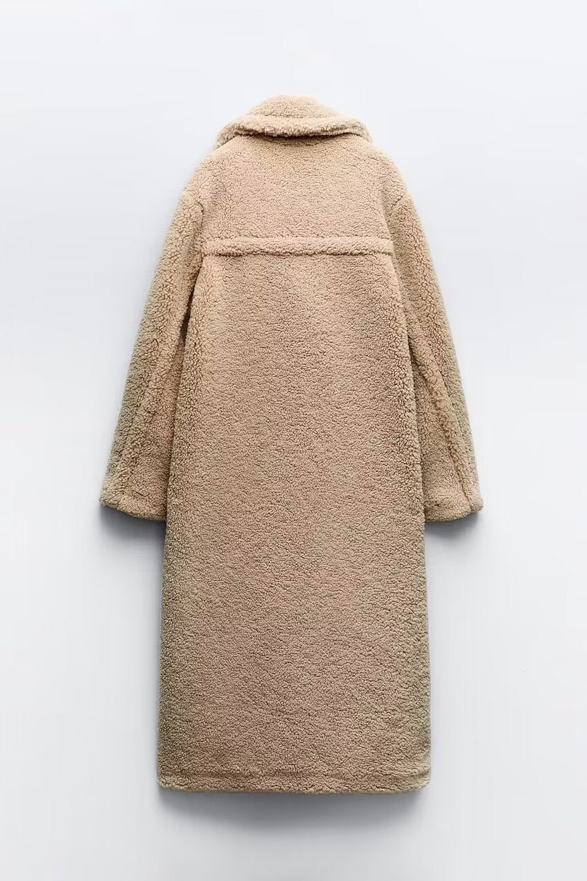Przejściowy płaszcz damski, elegancki i casualowy. Dwurzędowy, luźny krój. Idealny na chłodniejsze dni.
