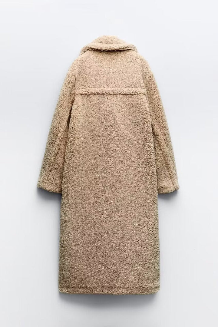 Przejściowy płaszcz damski, elegancki i casualowy. Dwurzędowy, luźny krój. Idealny na chłodniejsze dni.