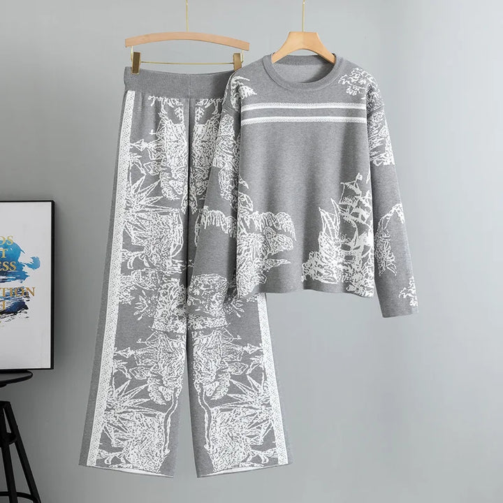 Damski dzianinowy komplet we wzory: sweter i spodnie wide leg. Modny styl casual na jesień.