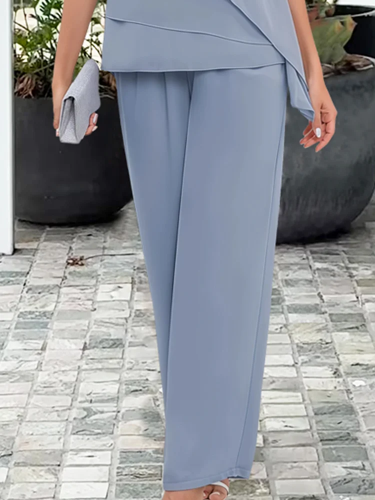 Elegancki damski garnitur wieczorowy ze spodniami i tuniką, stylizacja na wesele i uroczystości