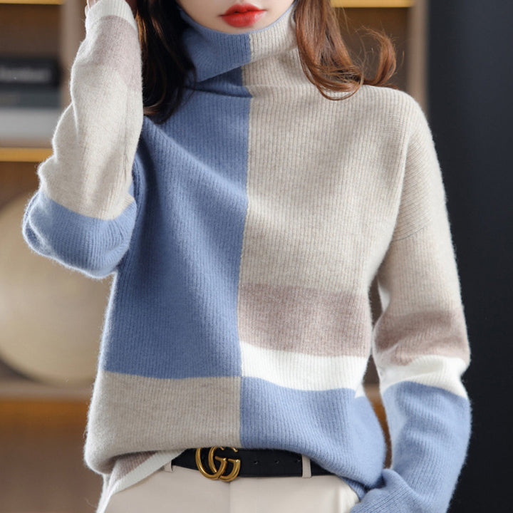 Damski golf zimowy colorblock. Stylowy, ciepły sweter z kolorowymi blokami, idealny na chłodne dni.