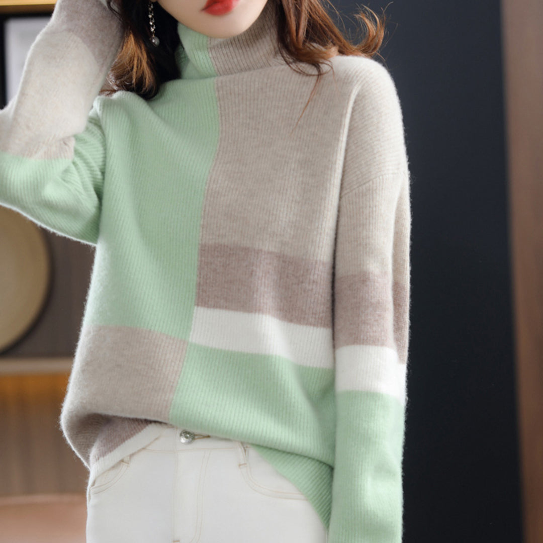 Modny golf damski z wzorem colorblock. Ciepły, elegancki sweter na zimę, doskonały do biura i na co dzień.