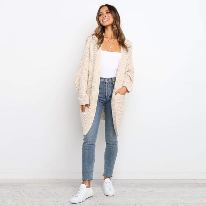 Jesienno-wiosenny sweter damski, kardigan oversize z dzianiny. Ozdobny splot dodaje stylu. Casualowy.
