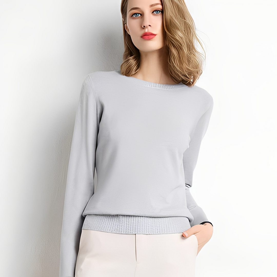 Elegancki damski sweter, klasyczny styl, modny dodatek do jesiennych i zimowych stylizacji.