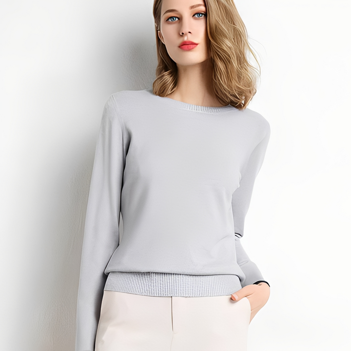 Elegancki damski sweter, klasyczny styl, modny dodatek do jesiennych i zimowych stylizacji.