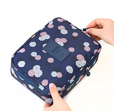 Zestaw: damski wodoodporny organizer podróżny na makijaż + gratis mini etui na kosmetyki.
