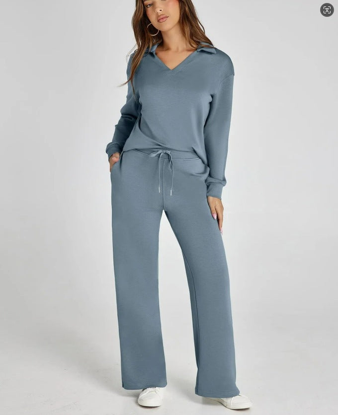 Luźny zestaw damski: bluza na suwak i spodnie wide-leg. Idealny na każdą okazję.