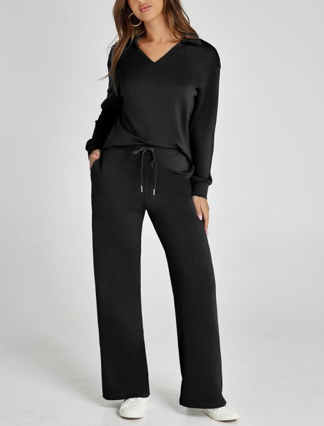 Damski komplet dresowy: granatowa bluza na suwak i spodnie wide-leg. Komfort i moda.