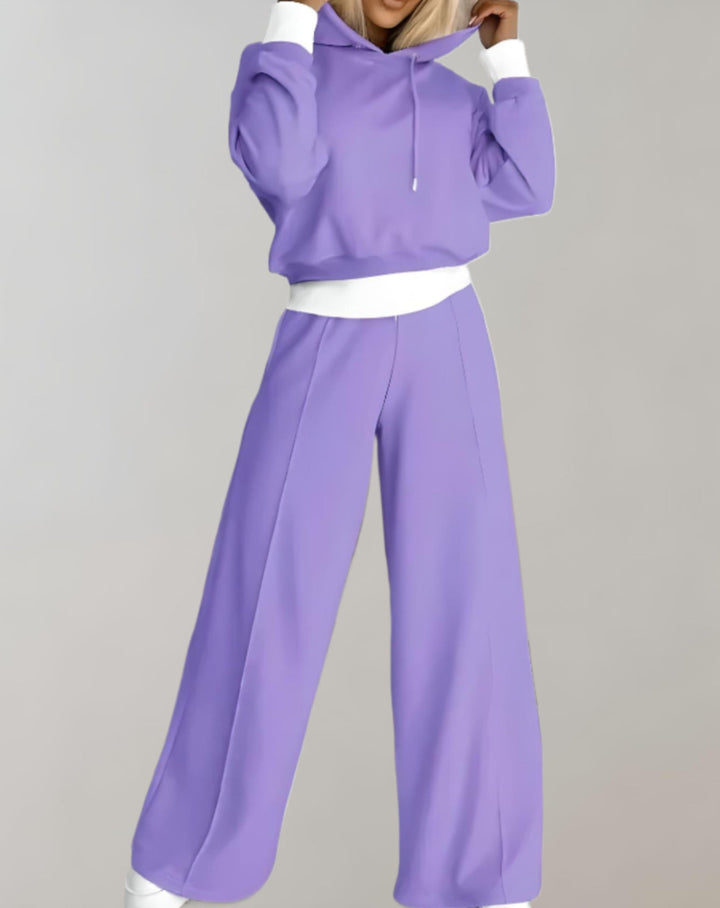 Komfortowy komplet loungewear damski. Miękki dres z bluzą i szerokimi spodniami. Idealny na relaks i aktywny wypoczynek.