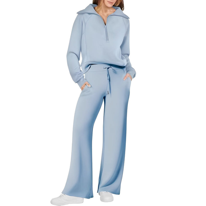 Zestaw damski loungewear, miękki materiał, sweter z długim rękawem i spodnie, komfortowy.