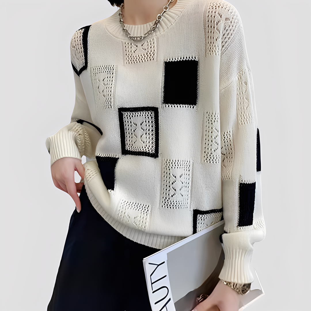 Damski sweter Christal, modny i ciepły na jesień/zimę. Idealny do casualowych i eleganckich stylizacji, zapewnia komfort.
