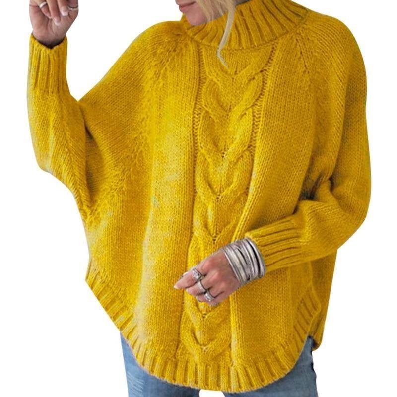 Modny sweter damski oversize z golfem i subtelnym haftem, luźny pulower dziergany.