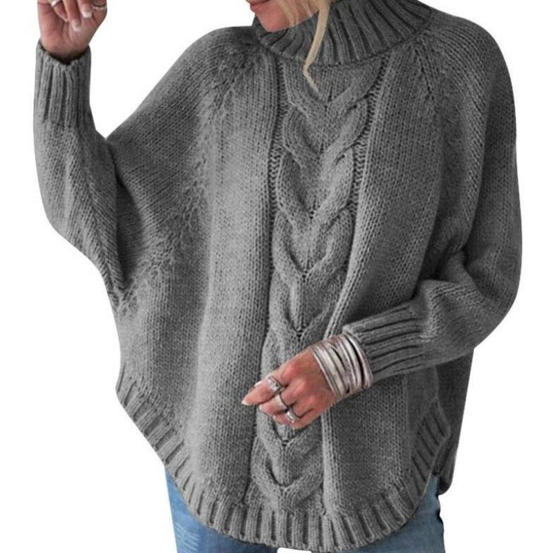 Ciepły dziergany sweter damski z golfem, fason oversize. Idealny na zimę, z pięknym haftem.