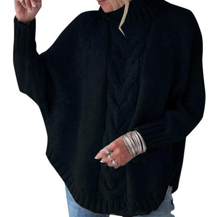 Elegancki sweter damski oversize z golfem, dzianinowy, z unikalnym haftem. Wygodny i stylowy.