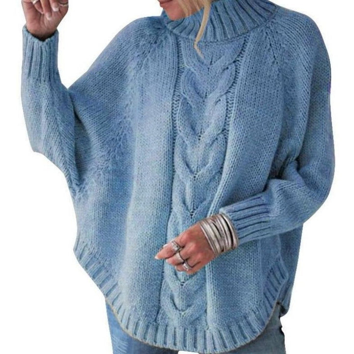 Sweter damski dziergany oversize z golfem, haftowany pulower. Modna i ciepła dzianina.