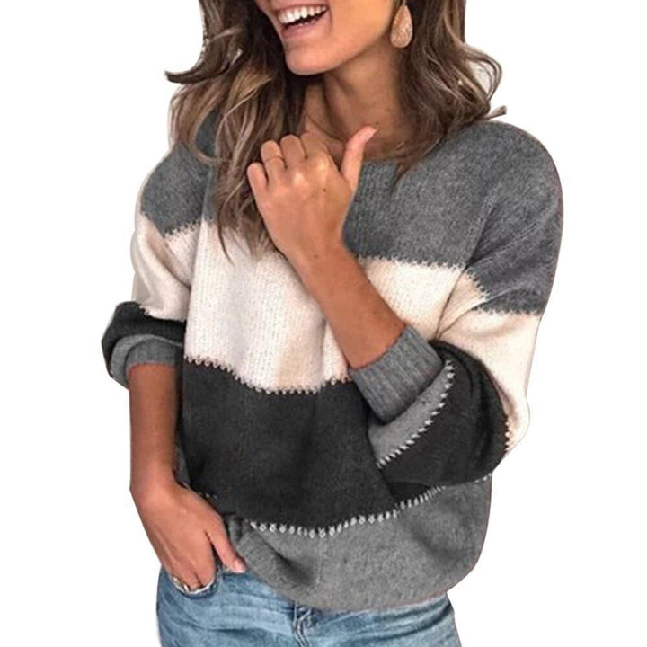 Wygodny sweter damski w paski, idealny do casualowych stylizacji. Dziergany z okrągłym dekoltem, jesień/wiosna.