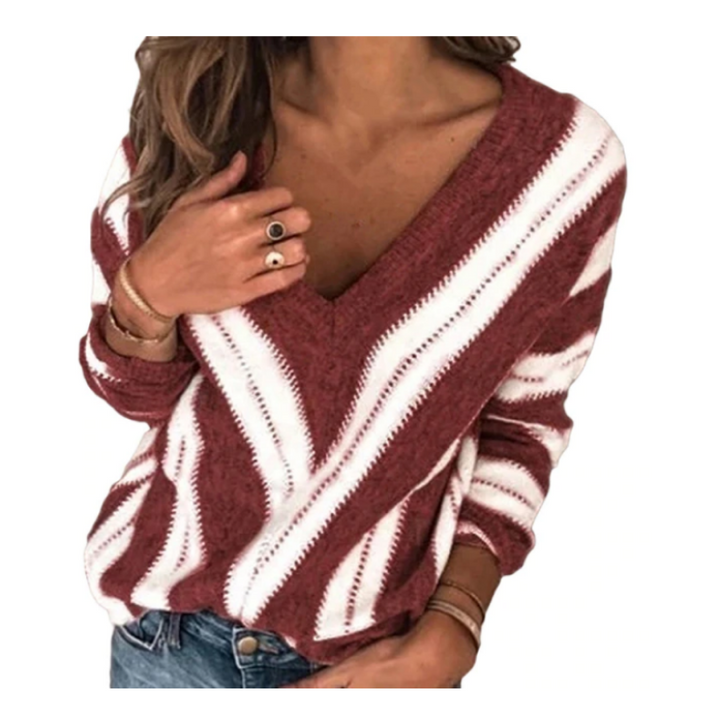 Casualowy damski sweter dziergany z poziomymi paskami. Luźny krój z dekoltem V-neck.
