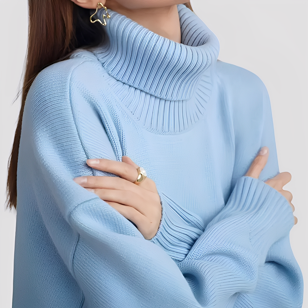Damski sweter golf oversize Nylah. Elegancki, wygodny i ciepły na jesień-zimę. Modny sweter casualowy.
