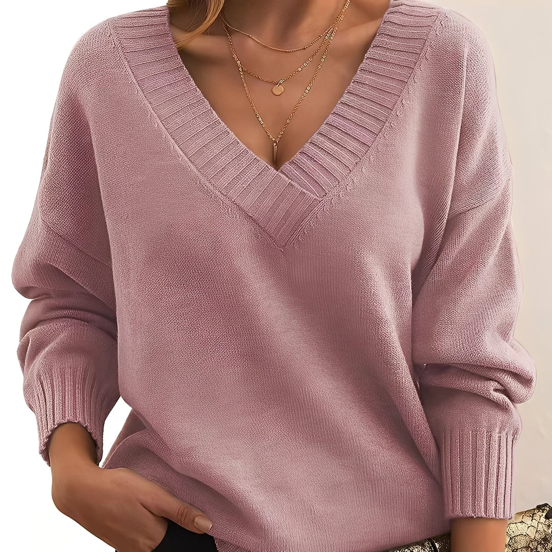 Wygodny sweter damski, idealny na jesień i zimę, połączenie elegancji i komfortu.