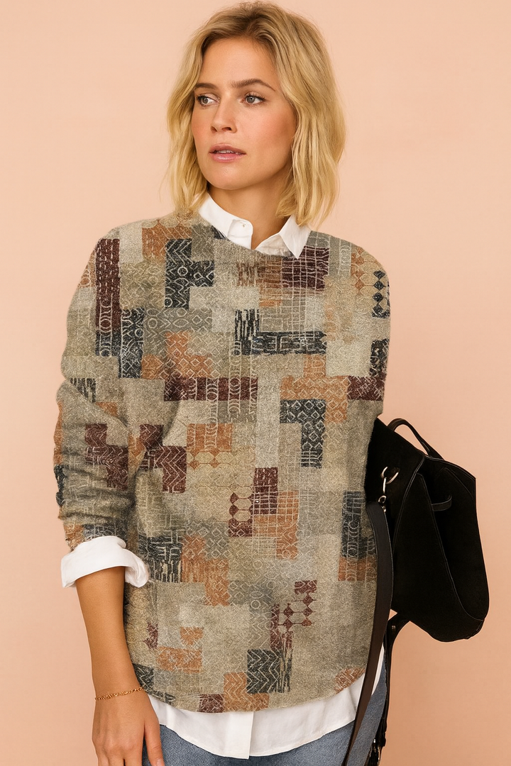 Damski sweter Nadia z artystycznym nadrukiem, modny i kolorowy. Idealny na jesień i zimę, casualowy styl.