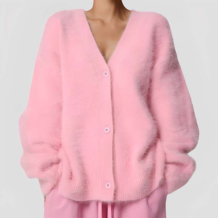 Damski sweter oversize. Przytulny i stylowy, idealny do stworzenia casualowych stylizacji.