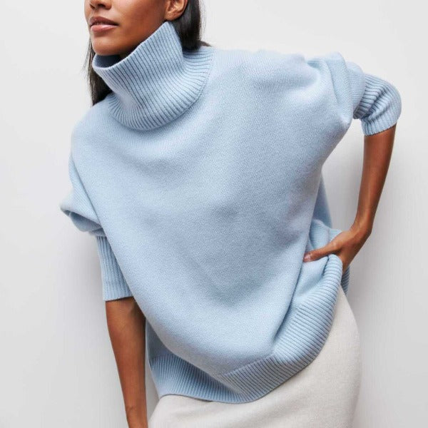 Damski sweter oversize z golfem, długi rękaw. Wygodny, ciepły i stylowy, idealny na jesień oraz zimę.